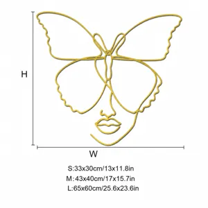 Gouden acryl spiegel muursticker met geometrische vlinder en vrouw gezicht lijnontwerp details.