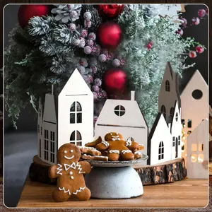 Detail of foldable wooden Christmas village decor with cute gingerbread cookies for winter styling.