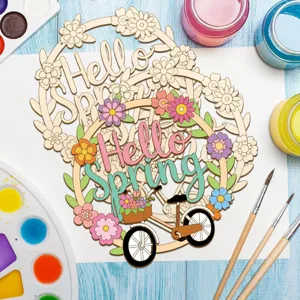 Unfinished wooden Hello Spring wreath DIY craft painting set with bicycle and flowers.