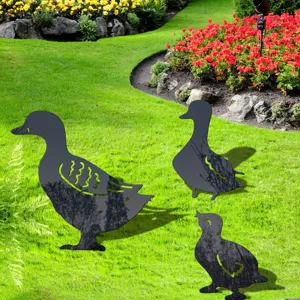 Acrylic duck family yard art stakes for outdoor garden lawn decoration and landscape design.
