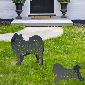 Outdoor decorative dog yard art stakes with hollow floral patterns, perfect for garden decor.
