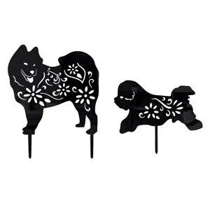Acrylic dog garden stakes detail shot, featuring black floral silhouette yard art decor.
