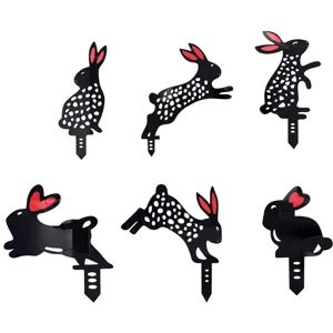 Black acrylic rabbit garden stakes, set of 6 decorative yard art silhouettes for outdoor decor.