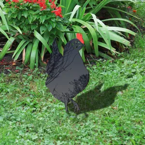 Acrylic chicken yard art garden stake detail shot, showing tree silhouette design on lawn.