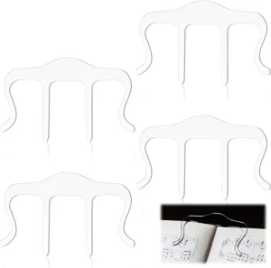 Transparent acrylic music book clip and bookmark for piano practice and sheet music holding.