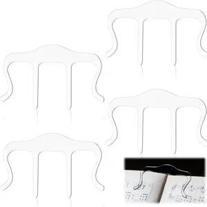 Transparent acrylic music book clip and page holder designed for piano practice and reading.