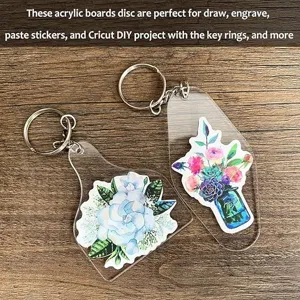 Clear acrylic keychain blanks set with metal rings for DIY craft and engraving projects.
