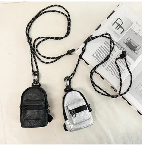 Mini bolso de mochila cruzado y para el cuello para mujer y hombre, elegante monedero de moda.