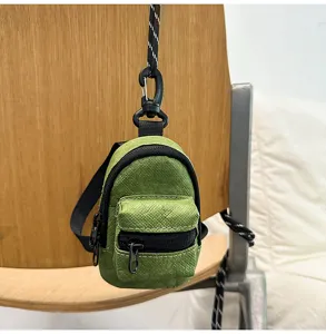 Mini mochila monedero auriculares bonita pequeña bolsa cruzada para mujeres y hombres, verde.