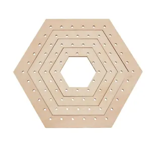 Wooden hexagon weaving loom detail closeup view, DIY knitting craft tool pin board.