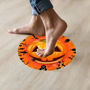 Close-up detail view of Halloween pumpkin floor sticker applied on wooden floor decor.