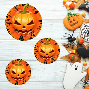 Halloween pumpkin round stickers detail showing spooky face design and festive prop setup.