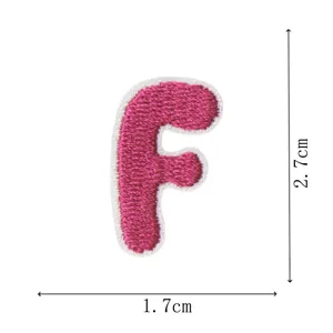 Cute pink letter F embroidered patch detail, mini iron-on DIY clothing accessory decoration.