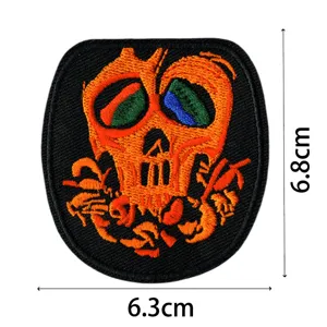 Detailed view of the embroidered music skull patch, showcasing fine stitching and vibrant color texture.