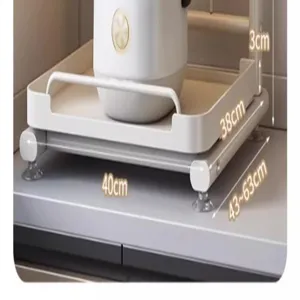 Kitchen appliance storage rack detail, adjustable pull-out shelf for microwave and rice cooker.