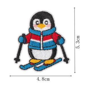 Cute ski penguin embroidered patch, DIY iron-on clothing accessory, size 4.8x5.3cm.