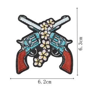 Western style cowboy revolver flower embroidery patch for clothes repair and decoration.