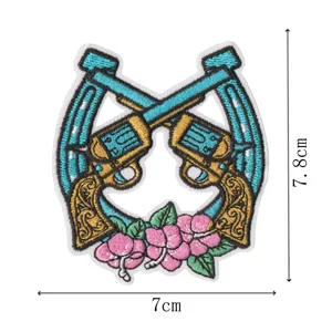 Close-up detail view of the western style cowboy embroidered patch featuring floral patterns.