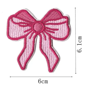 Pink bow embroidery patch detail shot, showing delicate stitching texture and accurate size 6x6.1cm.