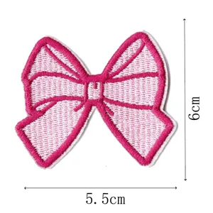 Pink bow embroidered patch for clothing bags and hat decoration, cute DIY fabric accessory.