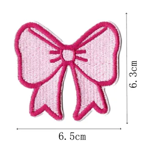 Pink embroidered bow patch for clothing, bags and hats decoration with clear size details.