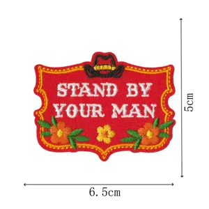 Embroidered cowboy patch badge with red background and slogan for clothing decor items.