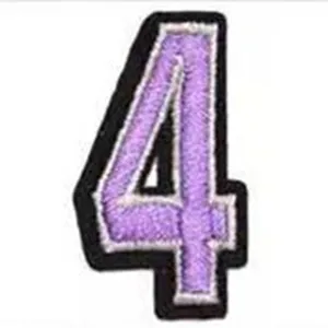 Embroidered number 4 patch with purple thread and black border, ideal for DIY clothing.