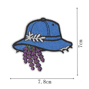 Blue hat embroidered patch with lavender design, clothing DIY repair accessory, 7x7.8cm.