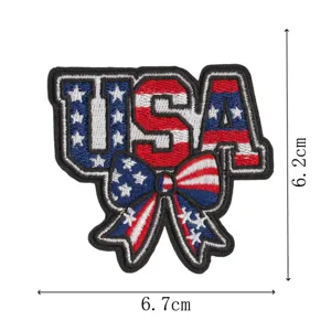 American flag USA embroidered patch with bow design, detailed fabric badge accessory for clothing.