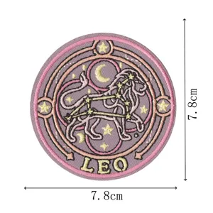 Detailed view of the round Leo constellation embroidered patch in purple and gold, 7.8cm size.