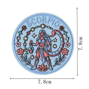 Close-up detail of the retro Scorpio zodiac embroidered patch, showing fine stitching and vibrant colors.