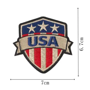 Detailed view of the American flag shield embroidered patch with USA lettering and stars design.