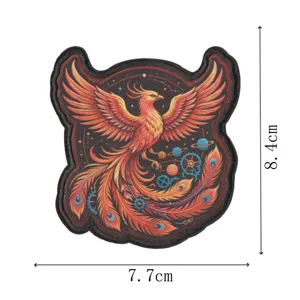 Detailed embroidered patch featuring a majestic phoenix with steampunk and celestial elements.