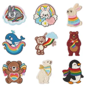 Cute cartoon animal embroidery patches with rainbow and cloud designs for clothing repair.