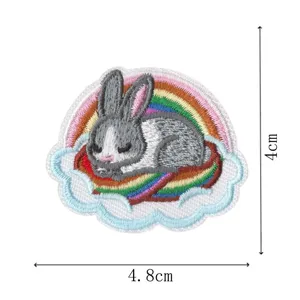 Detailed close-up of the cute grey bunny embroidery patch featuring rainbow and cloud, 4x4.8cm