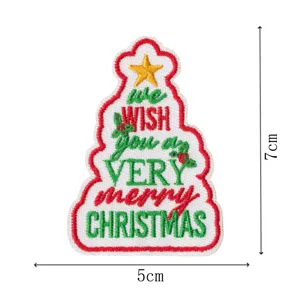 Christmas tree embroidered patch with festive lettering and iron-on backing for DIY apparel.