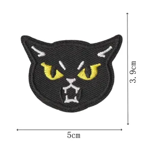 Gothic black cat embroidered patch detail, cute kitten clothing repair badge decor.