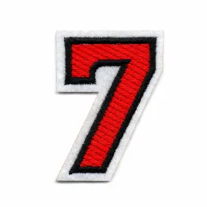 Detailed shot of number 7 embroidered patch, red and black border, iron-on DIY badge.