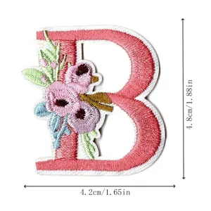 Embroidered letter B patch with floral details, ideal for DIY clothing accessories and crafts.