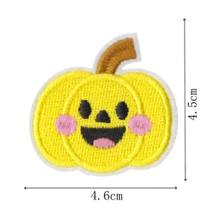 Cute yellow pumpkin embroidered patch with smiling face detail, perfect for clothing and DIY decor.