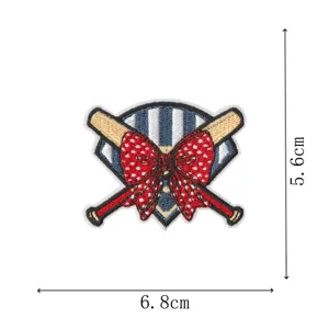 Baseball themed embroidered patch detail view showing crossed bats and red bow design.