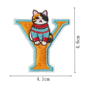 Cute calico cat letter Y embroidery patch self-adhesive clothing accessory for bags and pets.