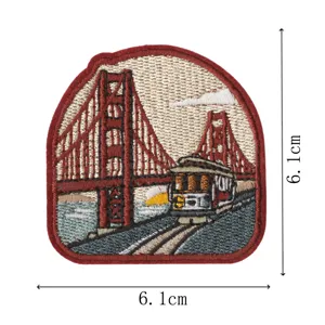 Golden Gate Bridge embroidered patch iron-on souvenir badge for clothing and backpack decor.