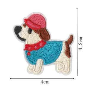 Close-up detail view of cute cartoon dog embroidered patch featuring vibrant colors.