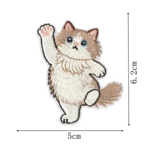 Cute cartoon cat embroidery patch iron-on decorative applique for clothes and backpacks.