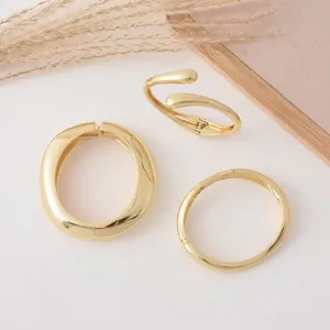 Gold metal hinged bangles set, minimalist open spring geometric bracelet jewelry.