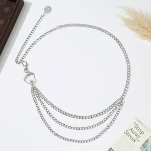 Silver multi-layer metal chain waist belt with sun and heart charm details for fashion outfit.