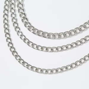 Silver multi-layer metal chain detail, sleek metallic finish for stylish waist and body chains.
