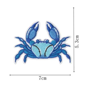 Blue crab embroidered patch, cute sea animal iron-on applique badge for clothing decor.
