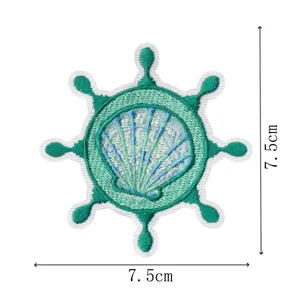 Embroidered ship helm patch with seashell motif, fabric DIY decorative badge measuring 7.5cm.